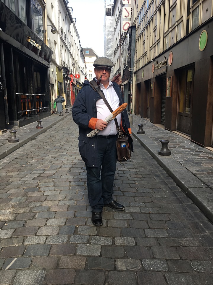 Bill Lutz with a baguette in Paris