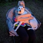 Wendy Sheridan hugging Lily the dog