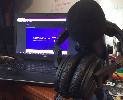 laptop showing Leftscape header, microphone, headphones