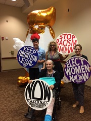 Mary McGinley, seated, with fellow NOW members, 2018