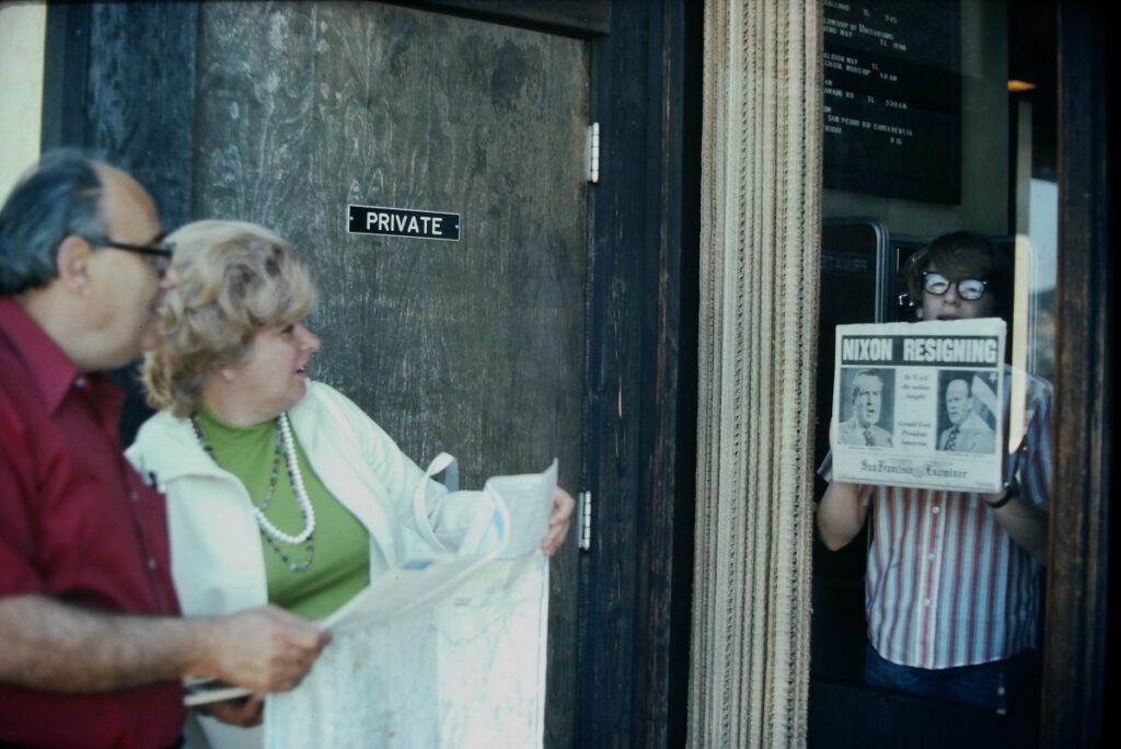 Schwartz Family Vacation 1974. David Schwartz holds a newspaper with the headline, "Nixon Resigning"