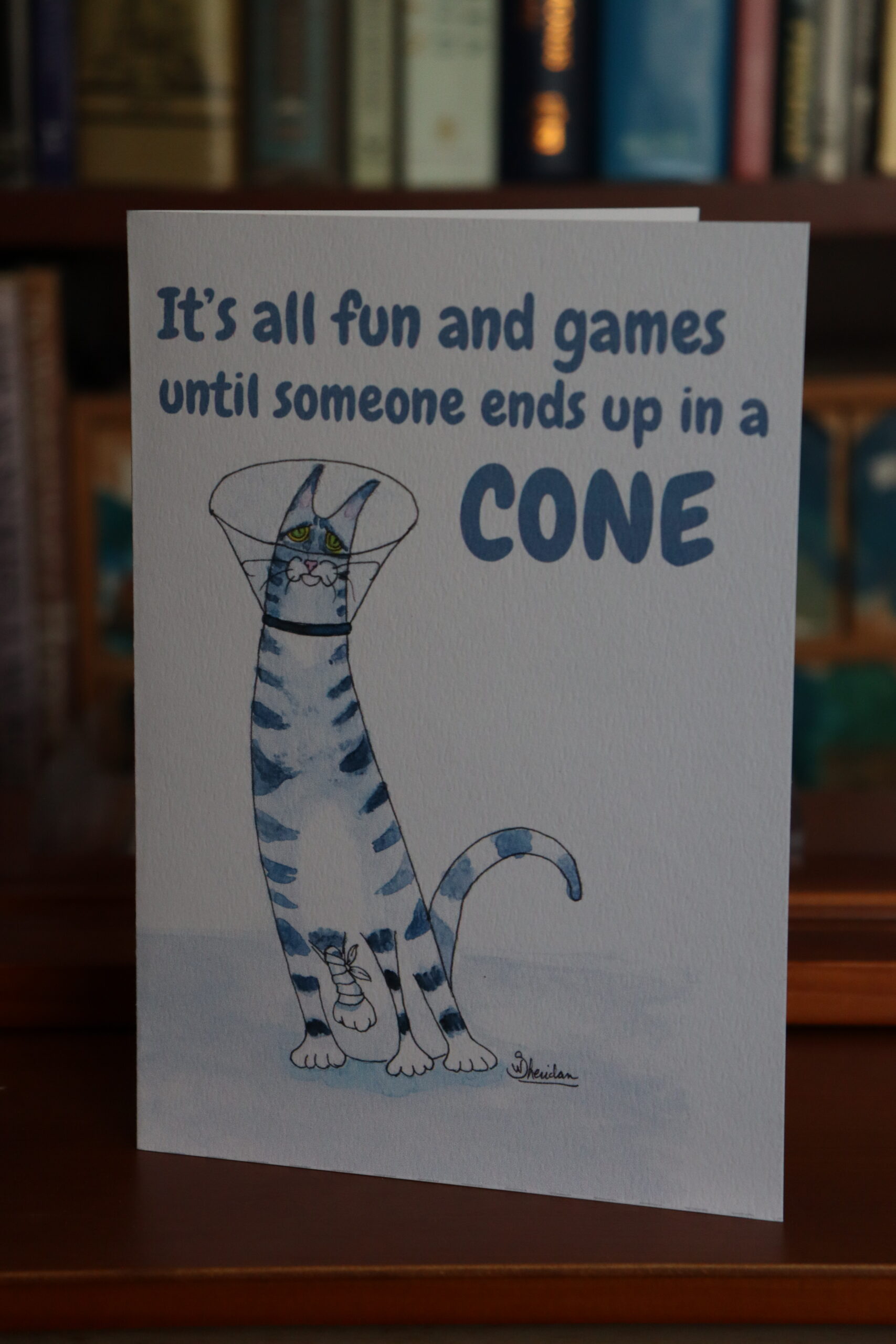 Cat in a cone "It's all fun and games..." get well card by Wendy Sheridan